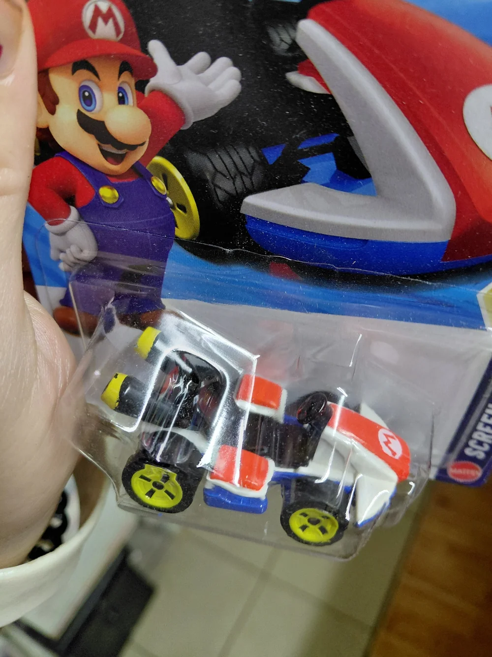 the Hot Wheels Mario Kart Standard Kart featuring Mario, part of the HW Screen T